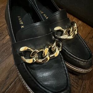 Anne Klein Black Slip-Ons with Gold Accent